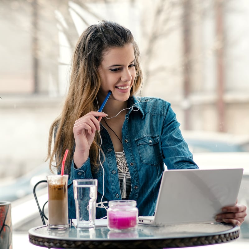 Young woman is watching a online course